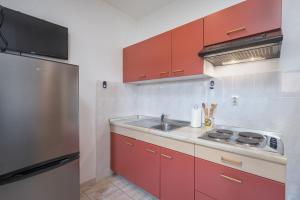 Kuchyň nebo kuchyňský kout v ubytování Apartments Lapida