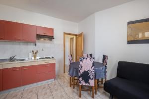 Kuchyň nebo kuchyňský kout v ubytování Apartments Lapida
