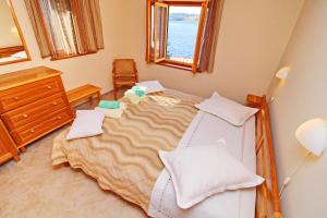 Postel nebo postele na pokoji v ubytování Holiday Home Katica