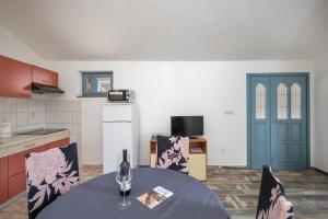 Kuchyň nebo kuchyňský kout v ubytování Apartments Lapida