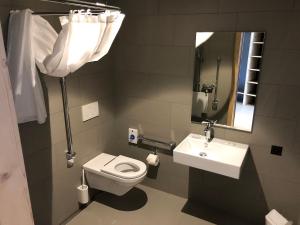Un baño de Catrina Hostel
