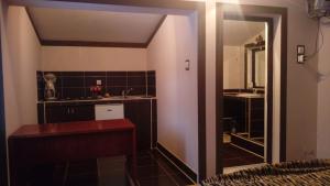 a bathroom with a sink and a mirror at Alpinlife in Dejani +43 photos