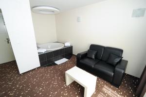 Posezení v ubytování City Hotel Krško