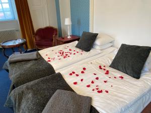 Voodi või voodid majutusasutuse Eksjö Stadshotell toas