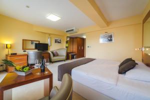 Krevet ili kreveti u jedinici u okviru objekta Hotel Podgorica