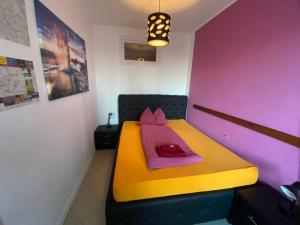 Posteľ alebo postele v izbe v ubytovaní Apartment Domino