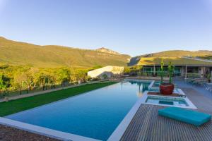 A piscina localizada em Pousada Amanhecer ou nos arredores