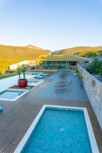 A piscina localizada em Pousada Amanhecer ou nos arredores