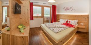 Postel nebo postele na pokoji v ubytování Villa Rosa-Panorama App