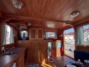 a kitchen with a sink and a counter top at Monte-Carlo for boat lovers in Monte Carlo