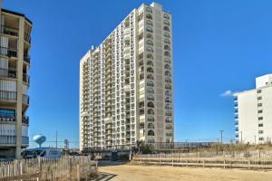 a tall apartment building in the middle of two buildings at Steps to Beach Scenic Condo in Ocean City! in Ocean City