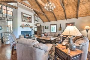a living room with couches and a fireplace at Monte Verde Lake Lodge with Hot Tub 4 Mi to Ski in Angel Fire
