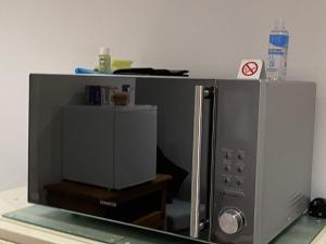 A kitchen or kitchenette at Pinewood Lodge 