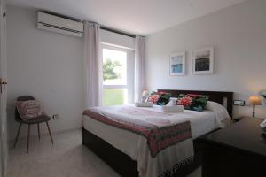 Posteľ alebo postele v izbe v ubytovaní Altaia Apartment