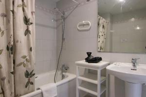 Ванная комната в Altaia Apartment
