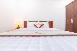 Voodi või voodid majutusasutuse Bao Ngoc Hotel & Apt toas