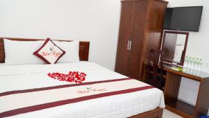 Voodi või voodid majutusasutuse Bao Ngoc Hotel & Apt toas