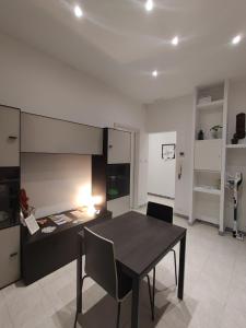 A television and/or entertainment centre at House Passarotti, 21
