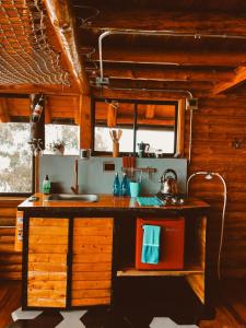 Kuchyň nebo kuchyňský kout v ubytování Skyline Ecoliving Santa Elena