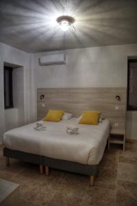 Tempat tidur dalam kamar di A PIANARELLA