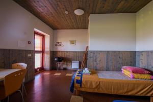 Postel nebo postele na pokoji v ubytování Saka Manor