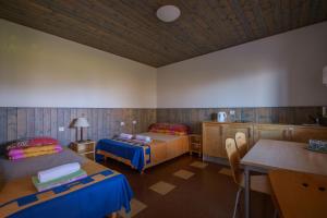 Postel nebo postele na pokoji v ubytování Saka Manor