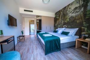 Postelja oz. postelje v sobi nastanitve ARGENTO RESIDENCE