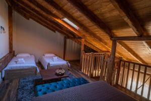 A bed or beds in a room at Mylaon Boutique Hotel & Spa