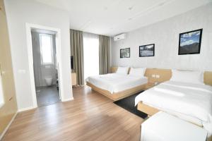 Postel nebo postele na pokoji v ubytování Hotel Auto Grill Roberti