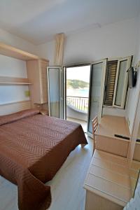 Postel nebo postele na pokoji v ubytování Hotel Incanto + 37 fotografií