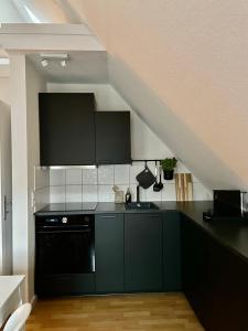 Kuchyň nebo kuchyňský kout v ubytování Ferienwohnung in Bad Bramstedt