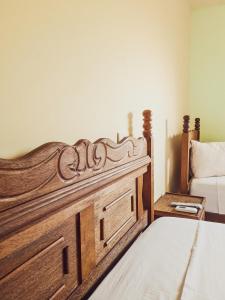 Vila Sancar Pousada客房内的一张或多张床位