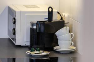 Príslušenstvo na prípravu kávy alebo čaju v ubytovaní Rajska 8 Apartments Old Town Gdańsk by Renters Prestige