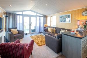 Гостиная зона в Chelsea Lodge - Aldeburgh Coastal Cottages