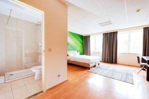 Postelja oz. postelje v sobi nastanitve Hotel Soret