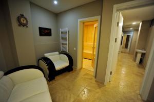 Postel nebo postele na pokoji v ubytování Hotel ZP Palace
