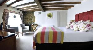 Katil atau katil-katil dalam bilik di Banbury Wroxton House Hotel