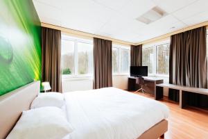 Postelja oz. postelje v sobi nastanitve Hotel Soret