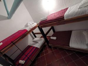 a pair of bunk beds in a room at Hostel Once Once in Villa de Leyva