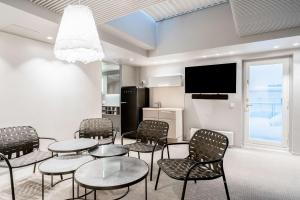 Televiisor ja/või meelelahutuskeskus majutusasutuses Radisson Blu Royal Hotel, Helsinki