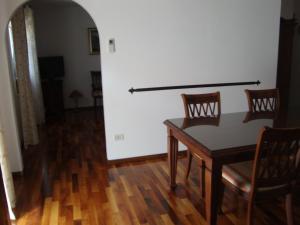 Posezení v ubytování Longo Apartment