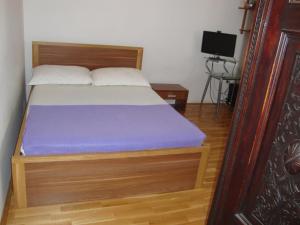 Postel nebo postele na pokoji v ubytování Longo Apartment