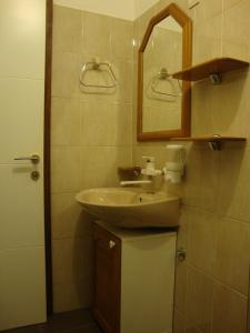 Phòng tắm tại Longo Apartment