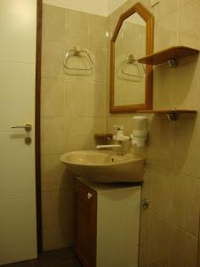 Koupelna v ubytování Longo Apartment