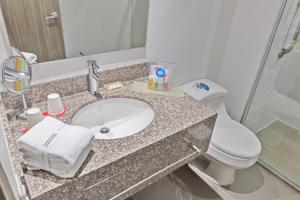 Ένα μπάνιο στο GHL Hotel Neiva