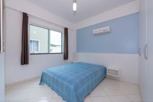 258 - Apto confortável na praia de Bombas tesisinde bir odada yatak veya yataklar