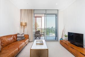 TV a/nebo společenská místnost v ubytování Nautica Residences Fremantle