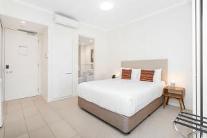 Postel nebo postele na pokoji v ubytování Nautica Residences Fremantle