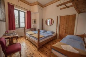 Letto o letti in una camera di Burg Plankenstein