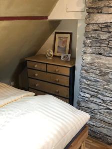 Postel nebo postele na pokoji v ubytování Haus An der Rur - 5 Apartments mitten in Monschau